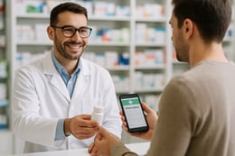 A picture showing a patient getting some medicine in a pharmacy after showing his eprescription to the pharmacist-1