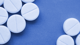 Pills on a blue background